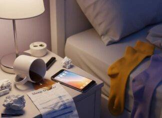 Why You Need a Sleep Specialist Near You for Better Health in 2025 A messy nightstand with a spilled coffee mug, glowing phone, crumpled sleep tracker, and mismatched socks.