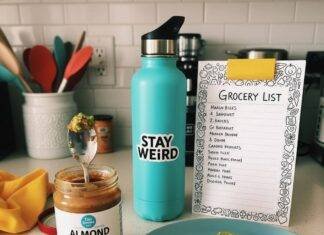 Top Nutrition Tips for Women: Eat Smart, Feel Great A blurry phone pic of a counter with avocado toast crumbs, a turquoise water bottle, a doodled grocery list, and a teaspoon stuck in almond butter.