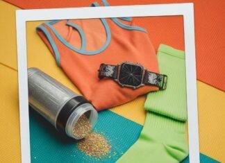 Fitness Apparel Trends 2025: Top 7 Styles to Stay Fit and Stylish A vintage Polaroid of a mismatched gym outfit with a stretched tank top, neon socks, a cracked smartwatch, and a spilled glittery protein shake.