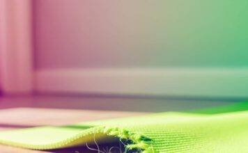 Why Sleep Disorder Education is Crucial for Your Wellbeing A blurry shot of a nightstand with prescription bottles, a book, a cracked phone with an insomnia thread, and a Pop-Tart on a sleep mask.