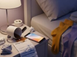 Why You Need a Sleep Specialist Near You for Better Health in 2025 A messy nightstand with a spilled coffee mug, glowing phone, crumpled sleep tracker, and mismatched socks.