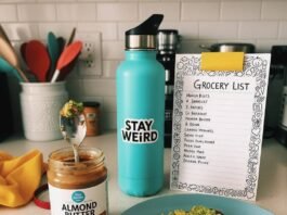 Top Nutrition Tips for Women: Eat Smart, Feel Great A blurry phone pic of a counter with avocado toast crumbs, a turquoise water bottle, a doodled grocery list, and a teaspoon stuck in almond butter.