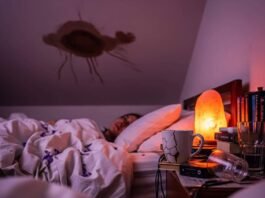 Sleep Therapy Near Me: Your Path to Restful Sleep A blurry, first-person shot of a person in bed, staring at a ceiling with a stain, with a salt lamp and scattered lavender petals.